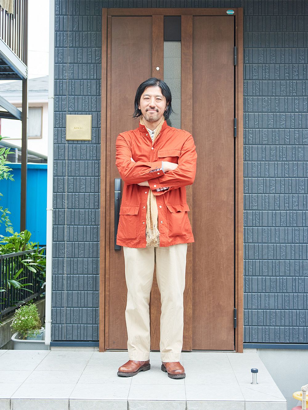 Takeshi Asami outside his home.