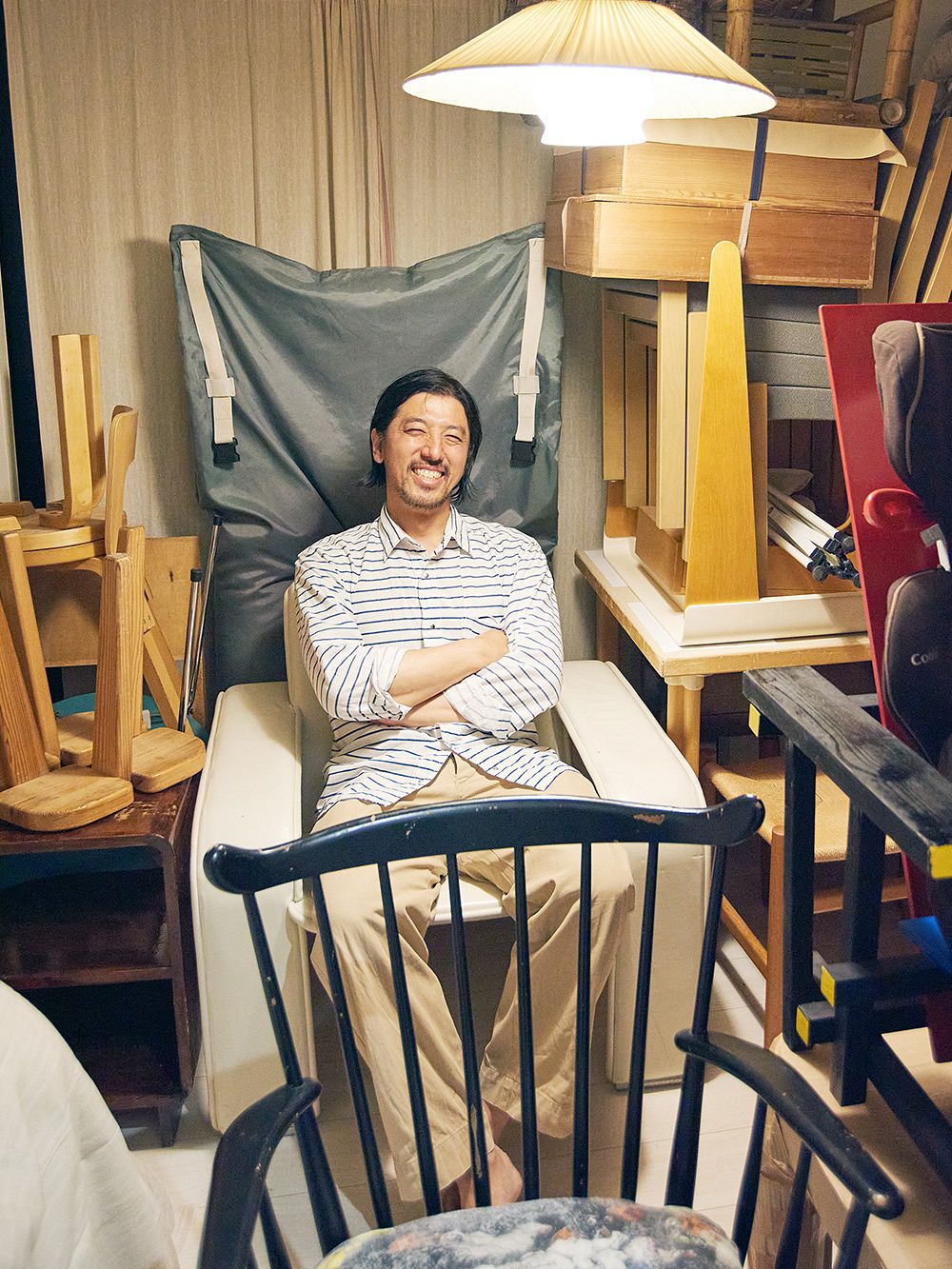 Takeshi with his stored vintage design finds.