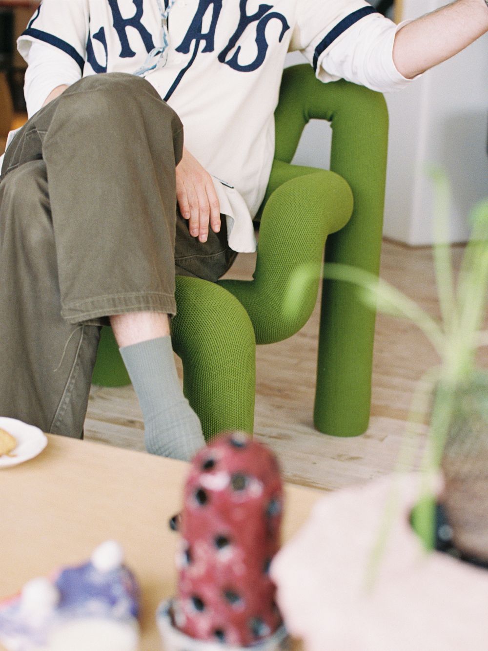 Maria Brinch sitting in the Ekstrem lounge chair, photographed by Johanne Nyborg